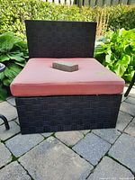 Front view of wicker chair and cushion