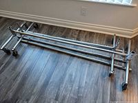 Chrome rack parts – two bases, two poles, one cross bar