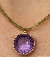 Necklace on model showing bead strand and pendant