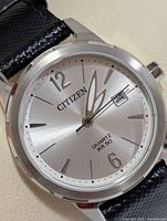 Front view of Citizen watch showing dial details