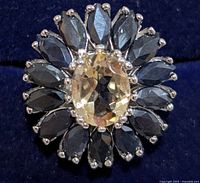 Top view of ring showing citrine center and onyx halo