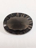 top view of oval smoky quartz gemstone