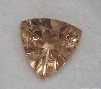 Front view of triangular peach tourmaline