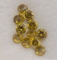 Close-up of all yellow diamonds showing color and cut