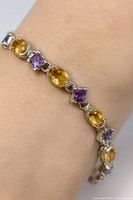 Bracelet on wrist showing overall appearance and gemstone pattern