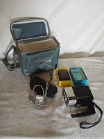 Overall view showing camera, carry bag, microphone, accessory case, film holders