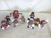 All nine raisin figurines grouped together