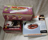 Three boxed kitchen items stacked