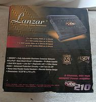 Retail box front showing model, specifications and image of amplifier
