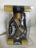 Front view of boxed miniature Callaway Golf 50th tour bag