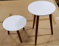 Tall and short stands side by side