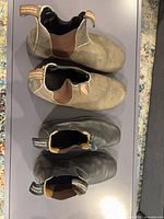 Top view of both pairs showing pull tabs and overall wear