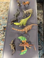 All nine Schleich figures lined on table