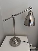 Front view of one lamp showing finish, base and shade