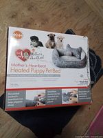 Box front showing K&H Mother's Heartbeat Heated Puppy Pet Bed