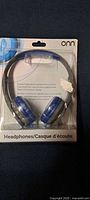 Front view of sealed ONN headphone package showing product and branding