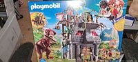 Front of sealed Playmobil 9429 box showing temple and T-Rex