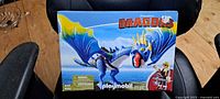 Front of sealed Playmobil Dragons box showing dragon and rider, 11 pc label