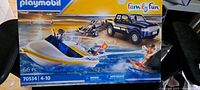 Front of sealed Playmobil Family Fun set box showing pickup, boat and accessories