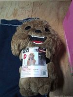 Rolled Chewbacca hooded blanket in packaging