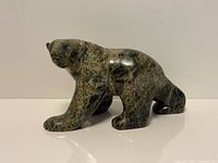 Side profile of full soapstone bear