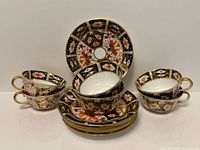 Full set of six Royal Crown Derby Old Imari teacups stacked with six saucers