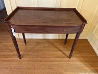 Full view of antique wooden console table