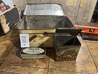 All three tins open and visible