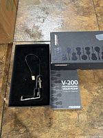 Pickup in original foam-lined box next to outer sleeve and booklet