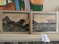 Both prints side by side in sleeves