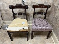 Both antique carved chairs side by side showing condition