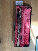 Clarinet inside open pink-lined case