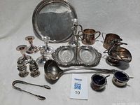 Entire group of silver-plated tableware on display