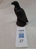 Side profile of heavy metal eagle figurine