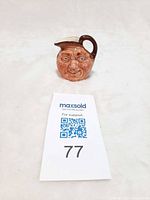 Front view of Royal Doulton John Barleycorn character jug