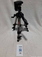 Full view of Optex T-12 tripod in standing position