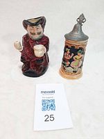 Front view of Royal Doulton Falstaff pitcher and German lidded stein