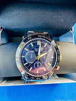 Front view of American Exchange wristwatch in box
