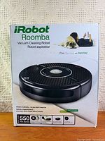 front of retail box showing iRobot Roomba Pet Series branding