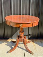 Full view of mahogany drum side table
