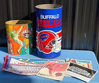 Overview of both waste bins and assorted paper memorabilia