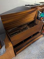 cabinet open showing gutted interior compartments