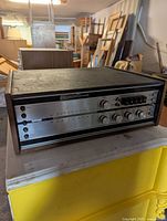 Front angled view of Electrohome receiver showing controls and tuner scale