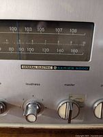 Close-up of tuning dial and knob layout on General Electric Series 5000 receiver