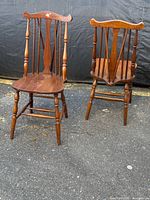 Front and side view of both wooden Windsor chairs