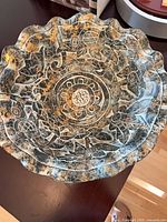 Top view showing patterned interior and scalloped rim