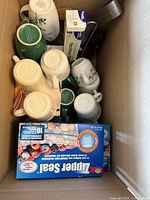 Box interior showing mugs, Zipper Seal bags, parchment paper, spoon