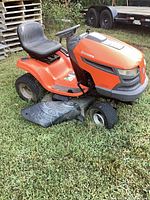 Full view of Husqvarna riding mower showing overall condition