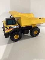 Left side view of Tonka 952 dump truck