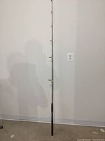 Full view of the 6'6" fishing rod showing overall length and guides